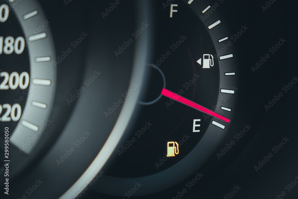Fuel gauge with warning indicating low fuel tank
